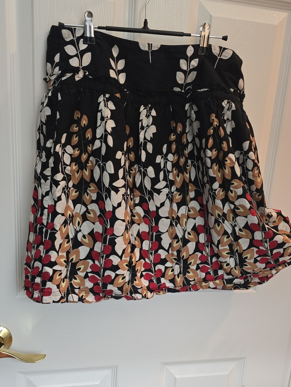 Black Floral Midi Skirt with Red and Tan Accents